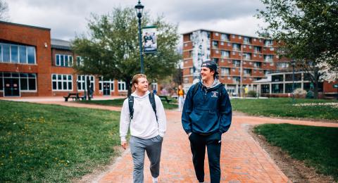 Two students walking around PSU campus