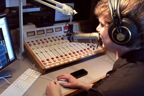 Chad Johansen DJing at student radio station