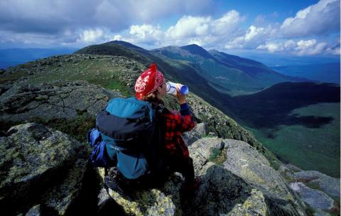 A hiker resting along a ridge on the Appalachian trail