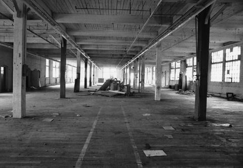 Plymouth State in 150 Objects exhibition photo of the abandoned Draper Maynard building interior