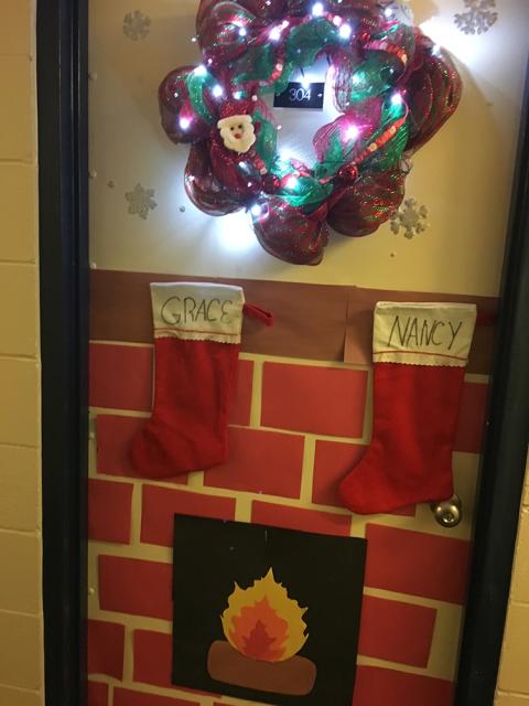 Plymouth State in 150 Objects exhibition 2020s Christmas stocking and wreath