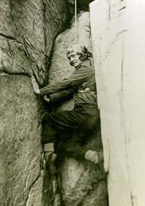 Miriam O’Brien (Underhill) ascends a chimney up a cliff near Boston in 1929
