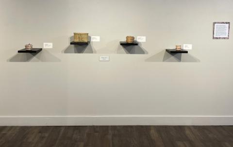 Of Baskets and Borers exhibition display of baskets