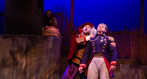 students on stage during the performance of Into the Woods 