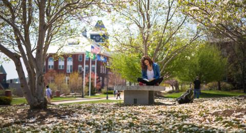 Plymouth student outdoors on campus