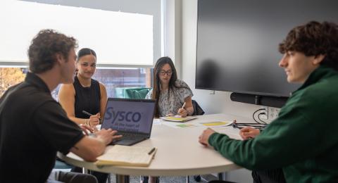 Students sitting at table 