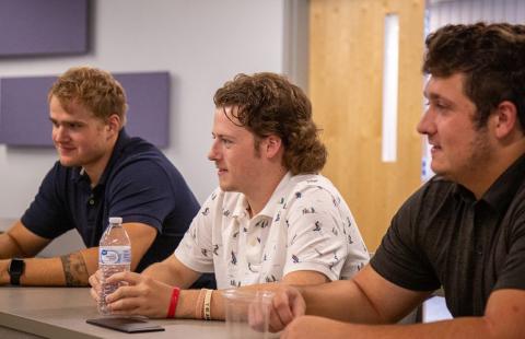 3 men at the luncheon
