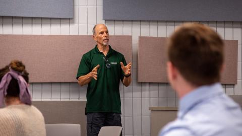 A professor speaking at the luncheon