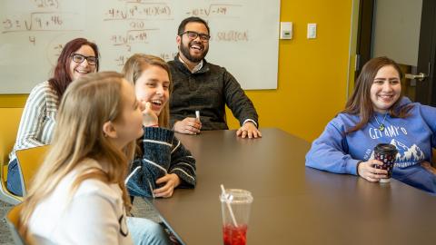 Residential employees actively doing group work