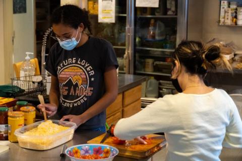 students making dinner