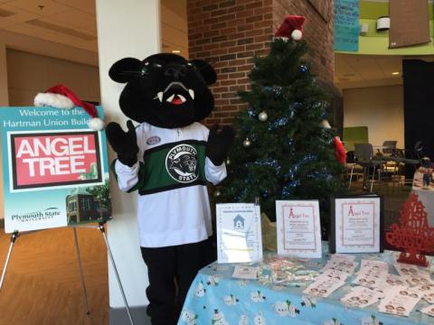 Plymouth mascot at holiday event