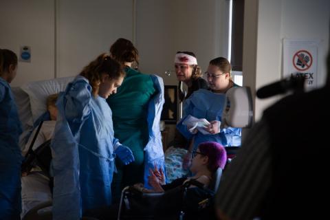 nursing students participating in a disaster simulation