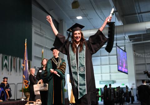 Student celebrating graduating