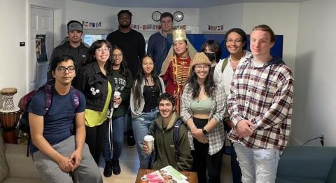 Group of students smiling for a photo.