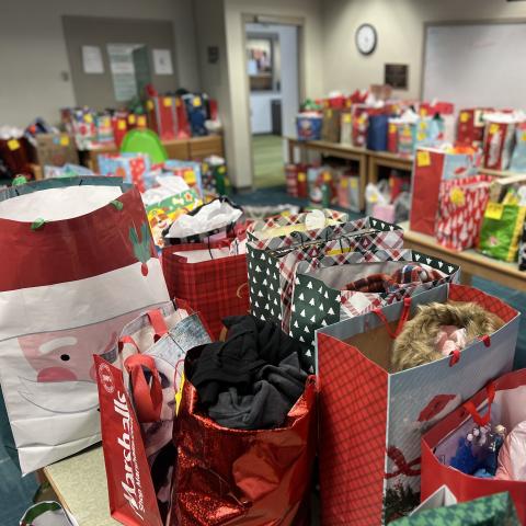 A bunch of gift bags huddled together