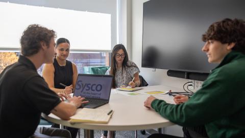 Students sitting at table 
