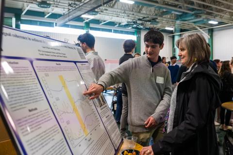 A student is presenting a poster titled “Final collection of sediment in settlement” by Tom O’Hara, David Hines, Trishin Harrison, Lisa Danner, and Simon Foulkes (P.S. Environmental Science and Policy Program). Includes two mentions of Actinobagella sp. isolated from sediments. Three nearly identical figures (Figures 1–3) each show a location of North Atlantic Ocean at 1000 m depth with sediment type described as “Sediments from the North Atlantic Ocean.” No data or visual differences are indicated between 