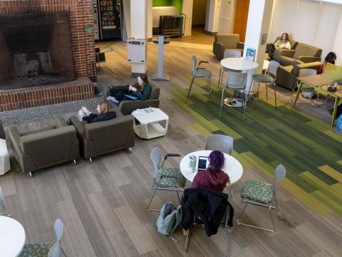 Students sitting in a lobby