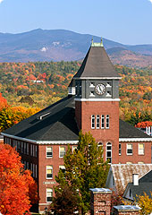 Iconic Rounds Hall Tower against the backdrop of fall foliage and the White Mountains.